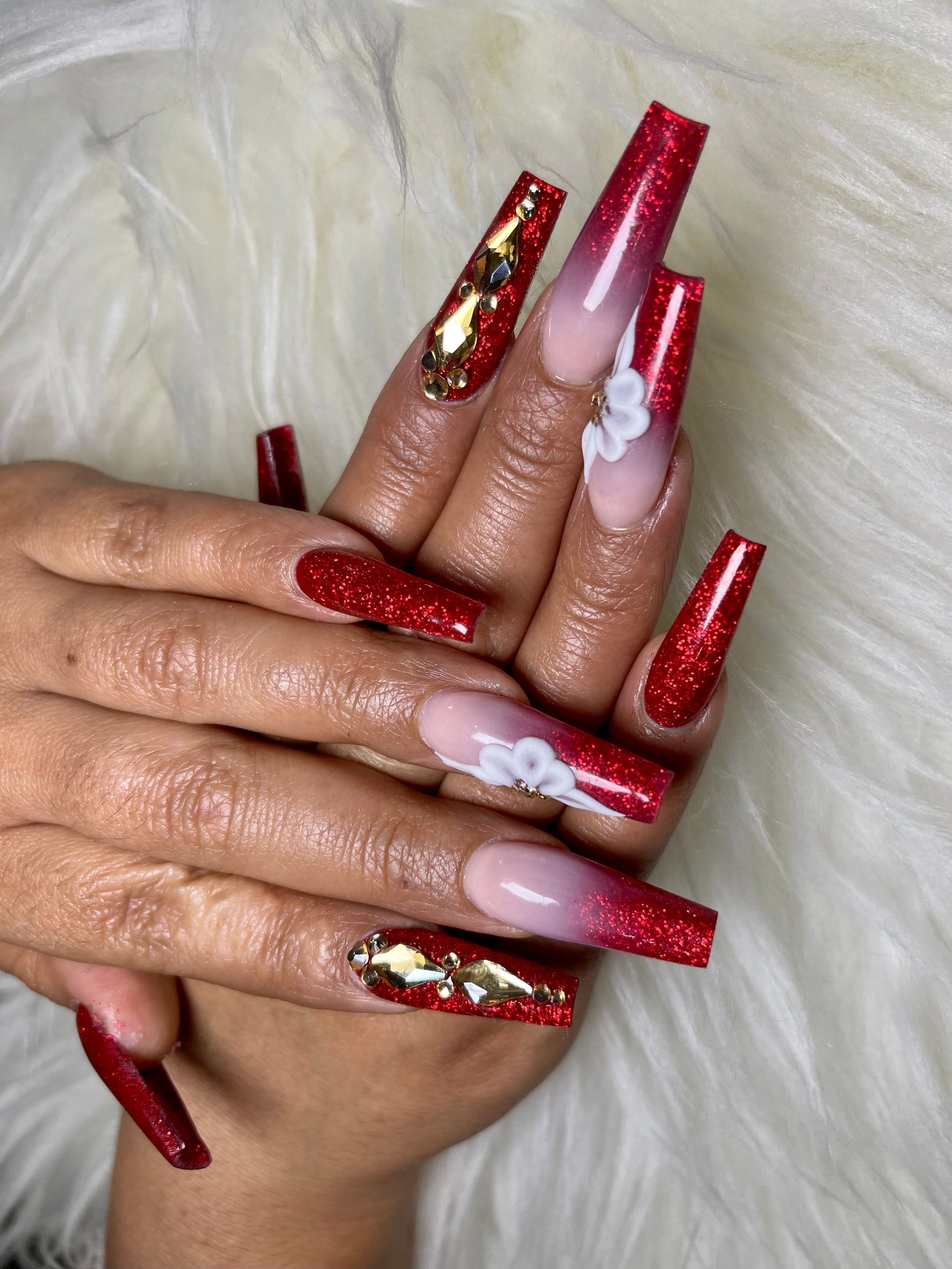 French ombre nail art with silver glitter accents