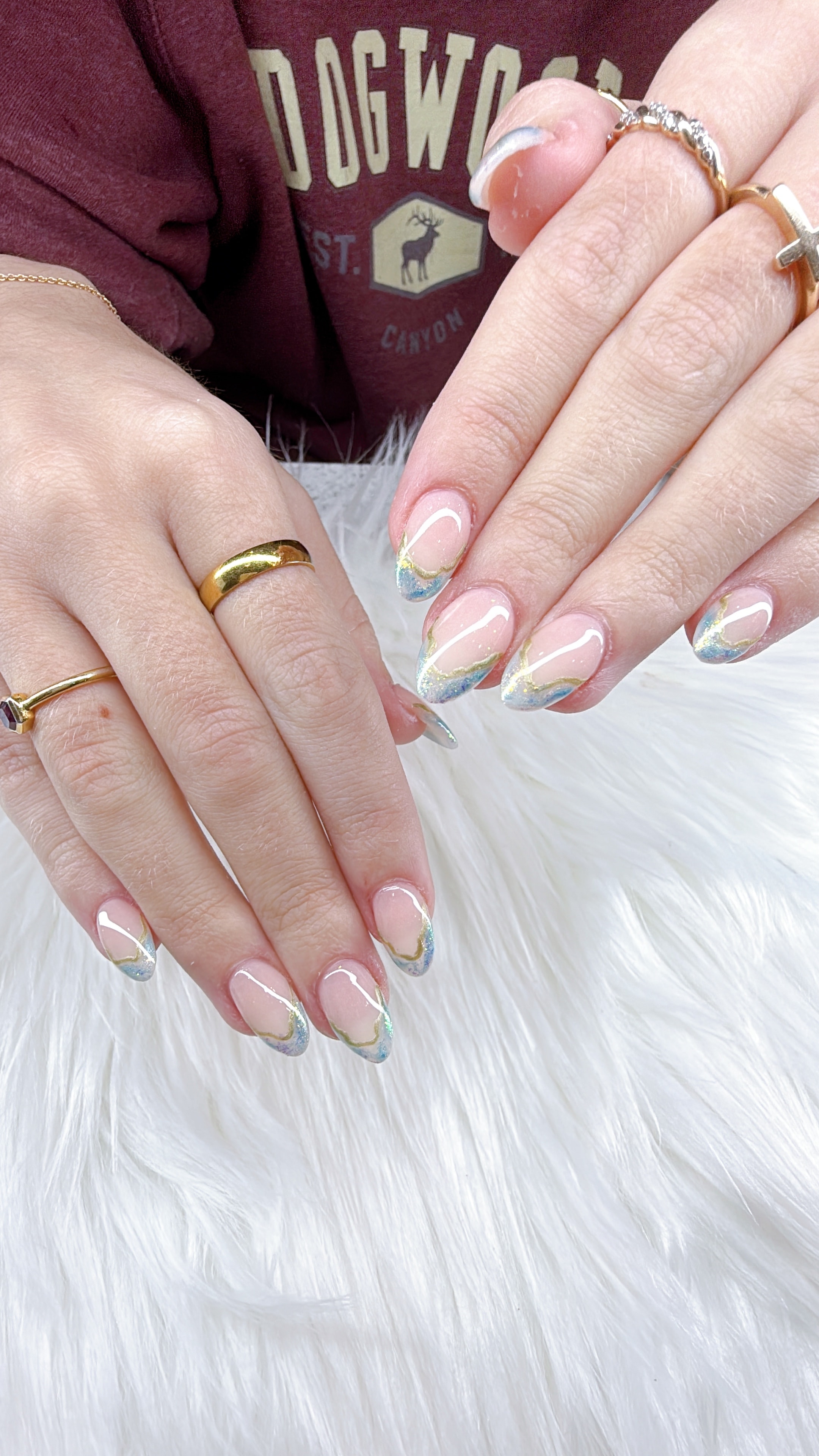 Nude and white ombre nails with floral accents