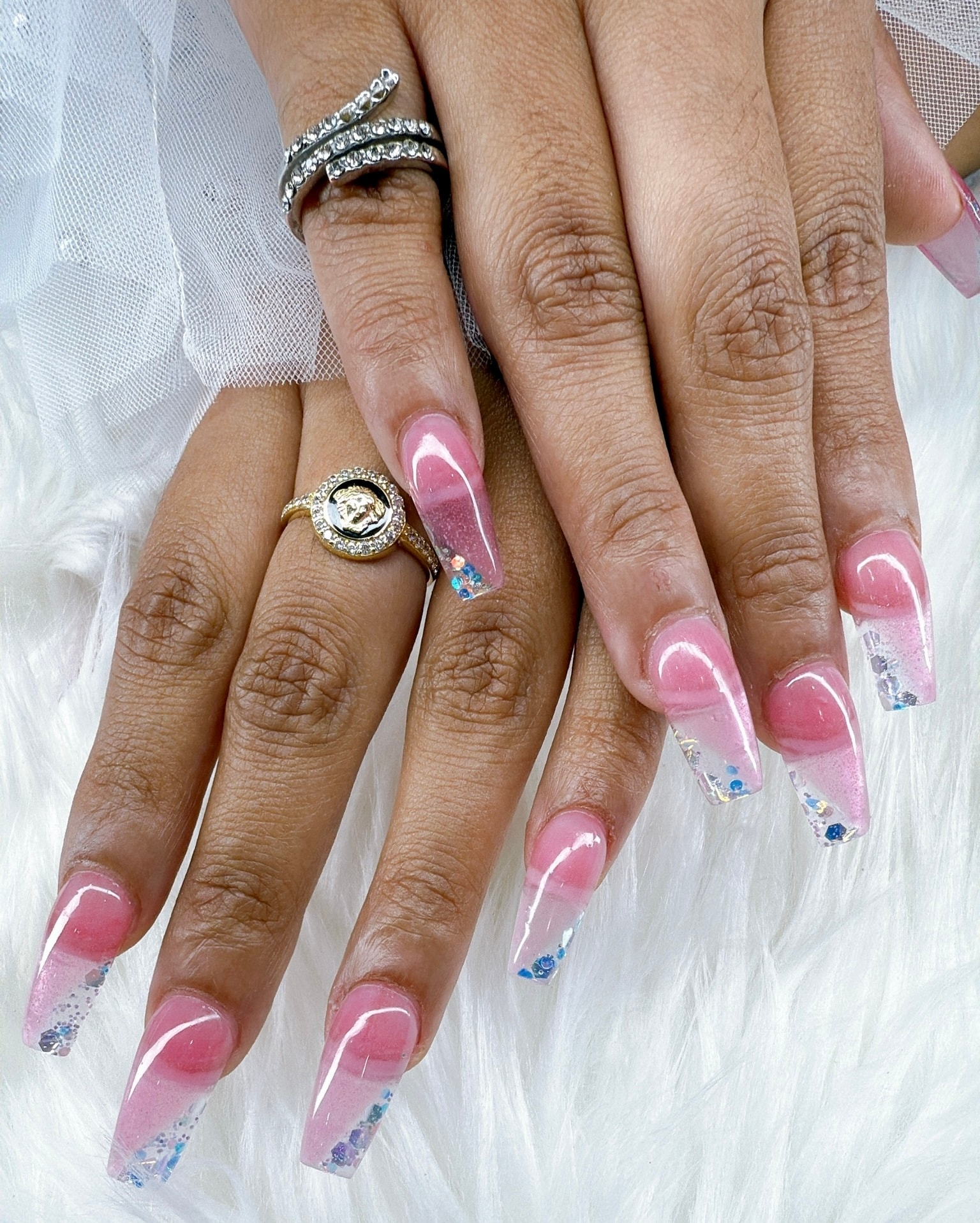 Pink ombre coffin nails with glitter accents