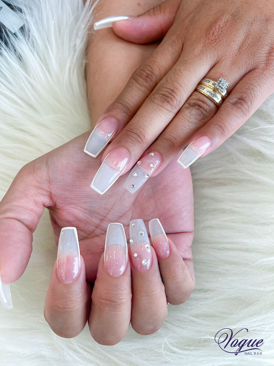 Pink to white gradient ombre nails with rhinestones